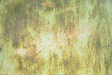 texture of an old rusty sheet of metal painted in white paint