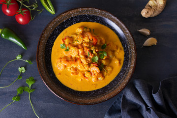 Creamy rich spicy shrimp curry. Seafood dish. View from above, top view