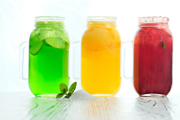 Lemonade with fruit in glass 