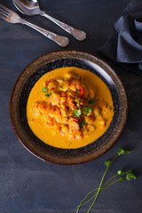 Creamy rich spicy shrimp curry. Seafood dish. View from above, top view