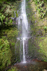 Caldeirao Verde waterfall at  the end of the hiking trail on the Levada Caldeirao Verde near Santana on the island of Madeira, Portugal.