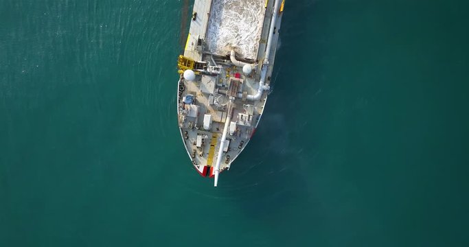 Aerial footage over Sand dredging ship in Mediterranean Sea Drone view over Sand dredging ship in Mediterranean Sea