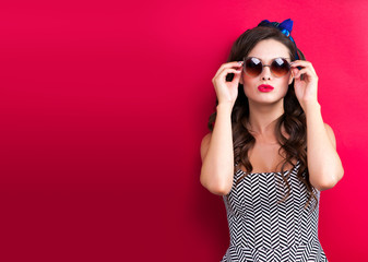 Cool hipster student woman wearing eyewear glasses . Caucasian female university student looking at camera smiling happy