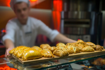 fresh pastries on the counter of the bakery department