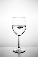 Glass with water up and splash