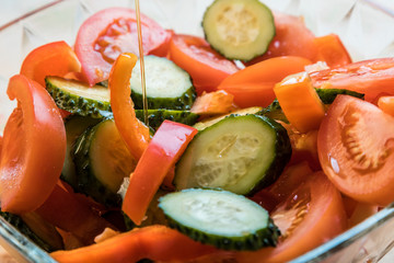 Vegetarian vegetable salad. Healthy food. Raw vegetables with olive oil.