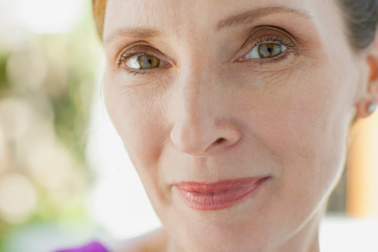 Close Up Of Middle Aged Woman With Serious Look