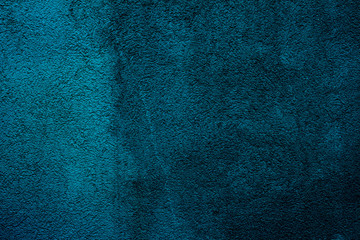 Abstract textured background in petrol or teal