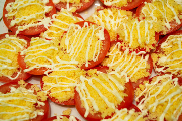 Tomatoes salad close up top view texture background, Mediterranean style with garlic and cheese or russian cuisine