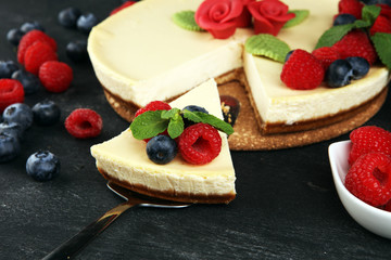 Homemade cheesecake with fresh raspberries and mint for valentines day - healthy organic summer dessert pie cheesecake. Vanilla Cheese Cake for dessert