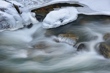 Winter landscape of Clear Creek captured with motion blur, Rocky Mountains, Colorado, USA