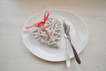 Valentine's Day heart on a plate. Elegant love concept for valentines day with sweet and romantic moment.