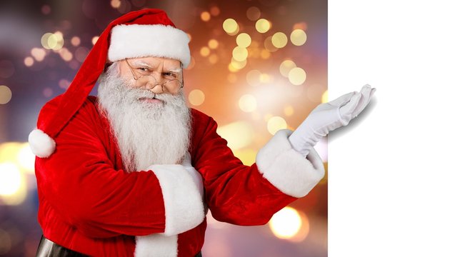 Portrait of Smiling Santa Claus with billboard