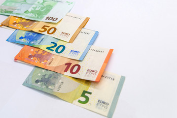 Euro banknotes isolated over white with clipping path