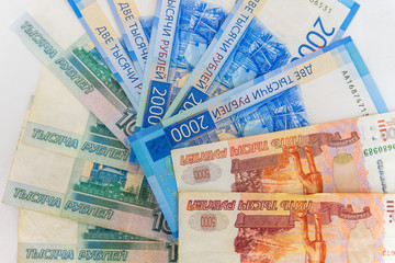 Scattered ruble currency banknotes, closeup view