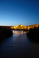 Fototapeta na wymiar The Roman Bridge over the Guadalquivir river and the Mosque Cathedral of Córdoba, Andalusia, Spain