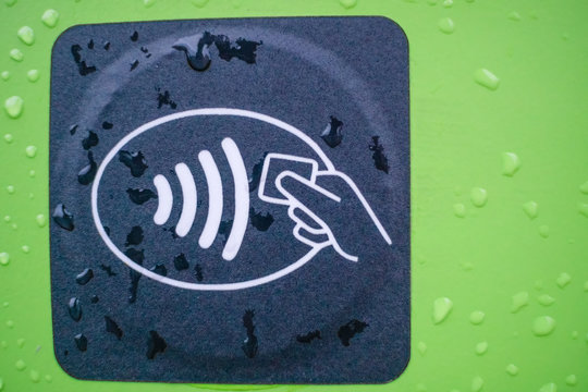 Close-up Of A Contactless Payment Sign On A Contactless Card Machine For Refueling Cars