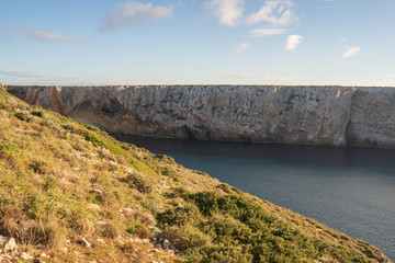 Fototapeta na wymiar Beach cliffs in Sagres coast in Portugal