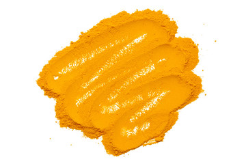 Dry turmeric powder isolated on white background.Close-up of powder orange color turmeric.top view