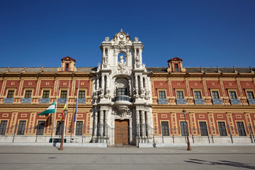 Fototapeta na wymiar The baroque facade of Palace of San Telmo, Seville, Spain