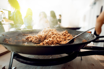 Paella pan with traditional Spanish food usually prepared with rice, meat, seafood