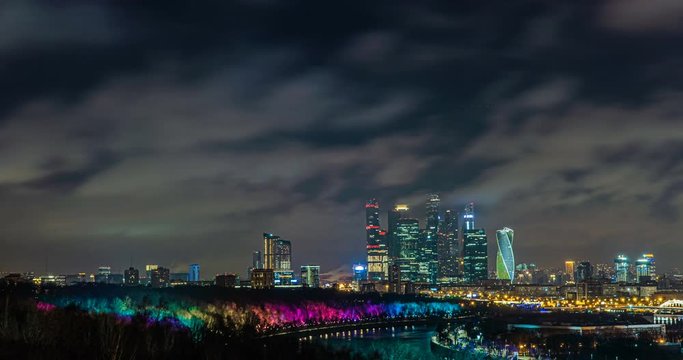 Evening Moscow, time lapse, fast flying clouds in the night sky over Moscow, 4k, beautiful evening cityscape, view from Vorobyovy Gory