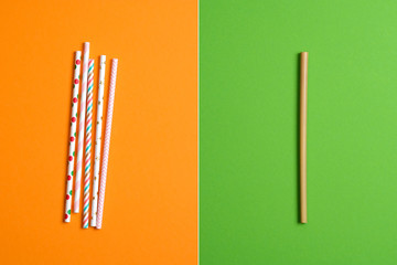 Disposable Plastic Cocktail Drinking Straws vs Eco friendly Reusable Organic Bamboo Drinking Straw. Comparison concept. Plastic free, Zero Waste, Sustainable Lifestyle