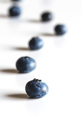 Group of fresh blueberries isolated on white background. Healthy food, health