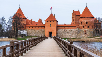 Fototapeta premium Medieval red brick castle on island in Trakai, Lithuania.