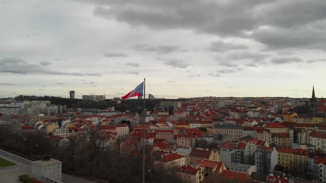 Prague, Czech National Flag Waving on Vitkov Hill, Twilight Aerial View With Zizkov District and TV Tower in Background