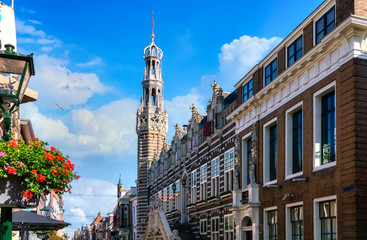 Historic old town of Alkmaar, North Holland, with typical dutch houses and the bell tower of the Grote Kerk