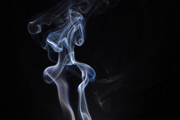 Fototapeta premium Abstract smoke isolated on dark background