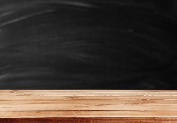 Black chalkboard  background and a wooden board