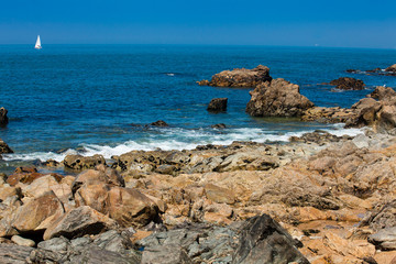 Fototapeta na wymiar Sunny day at the beautiful coastline and beaches at Porto city in Portugal
