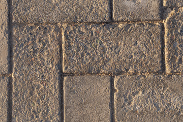 Paving from tiles. Graphic element on a stone. Construction product.