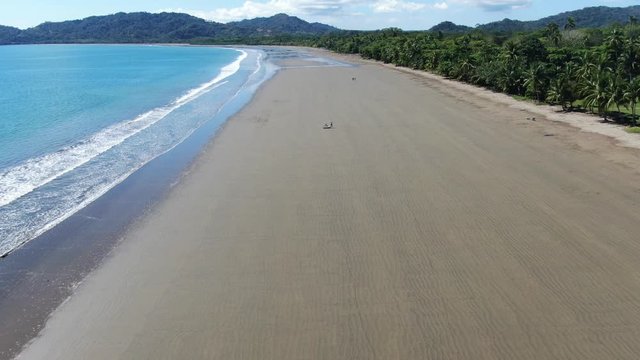 Empty beach rising picture from a drone
