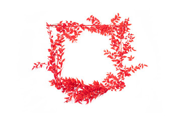 frame with red leaves on white background. Flat lay, top view