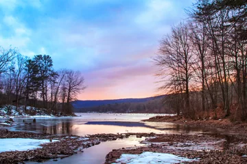 Fotobehang Chocoladebruin winter landscape with river and trees  © Brian