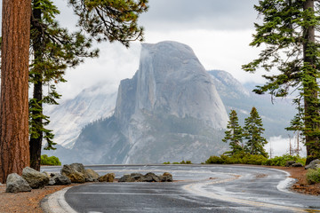 Half Dome in Yosemite National Park in October right after the rain.  View from winding Glacier Point road. California, USA.