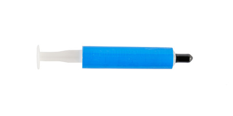 Generic tube of thermal paste used for heat dissipation between computer CPU (processor)/GPU and cooler, isolated on white background.