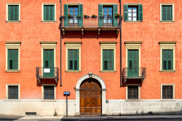 Fototapeta na wymiar Colorful building facades in Italy