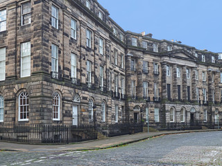 street with old stone palladian style building