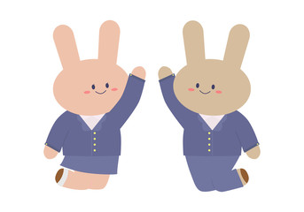 ハイタッチをする制服を着た学生うさぎ