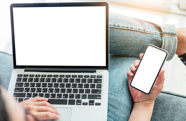 mockup image blank screen computer,cell phone with white background for advertising text,hand man using laptop texting mobile contact business search information on desk in office.marketing,design