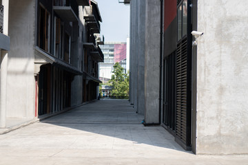 The alley with loft architecture Concrete Cement style . Modern chinese loft architecture  background