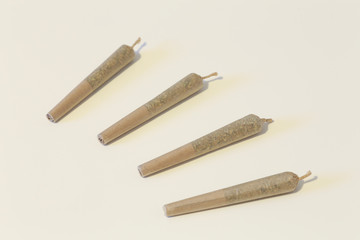 Pre-rolled Weed Cigarettes in an Isolated Background.