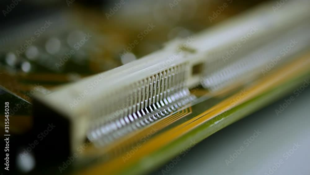 Poster macro close up view of pcb connector. slow dolly right
