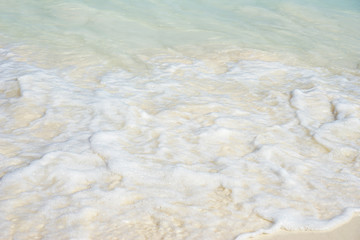 White sand beach and  buble waves of the blue sea at Similan Islands National Park, Phang Nga Province, Thailand, Asia.