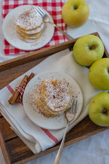 Fried pancakes filled with ripe autumn apples