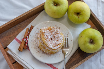 Fried pancakes filled with ripe autumn apples